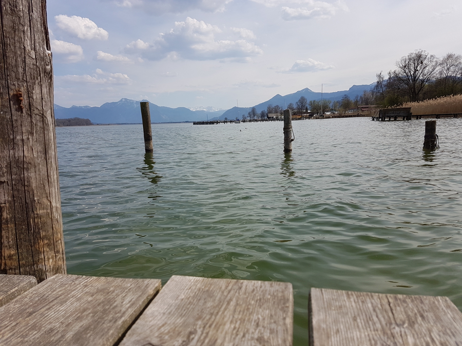 Chiemsee lake in Germany day trip in the spring, Alps in the background, Bavarian lake